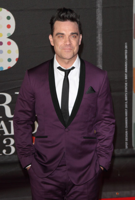 How tall is Robbie Williams