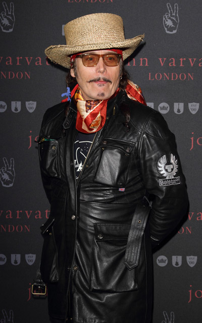 How tall is Adam Ant