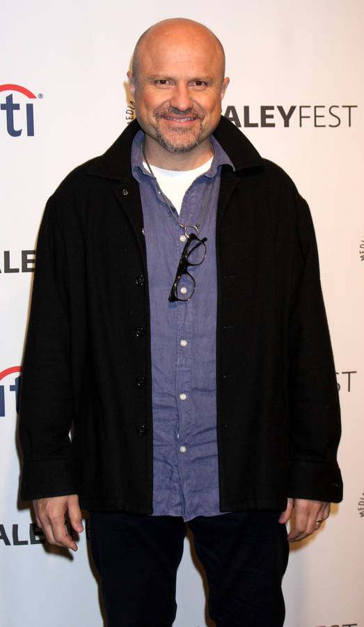 How tall is Enrico Colantoni